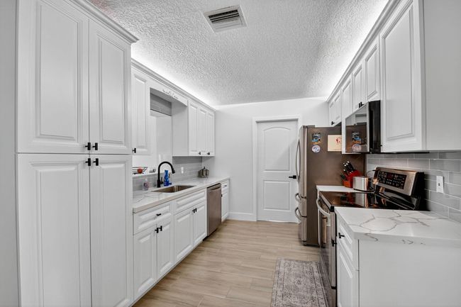 735 La Costa Way, House other with 3 bedrooms, 2 bathrooms and null parking in Lantana FL | Image 16