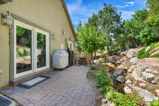 View of patio / terrace with area for grilling and outdoor dining space | Image 36