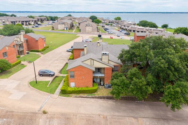 Aerial view of residential area with a nearby body of water | Image 32