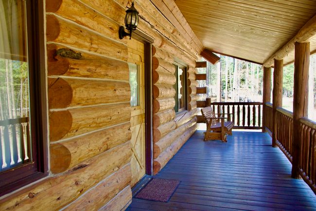 Wooden terrace featuring a porch | Image 49