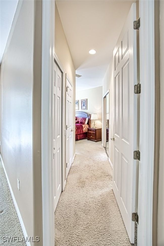 Hallway featuring carpet | Image 27