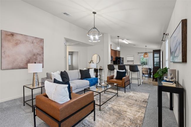 Living area opens to the kitchen and dining | Image 6