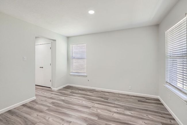 Unfurnished room with recessed lighting, baseboards, and light wood-style floors | Image 9