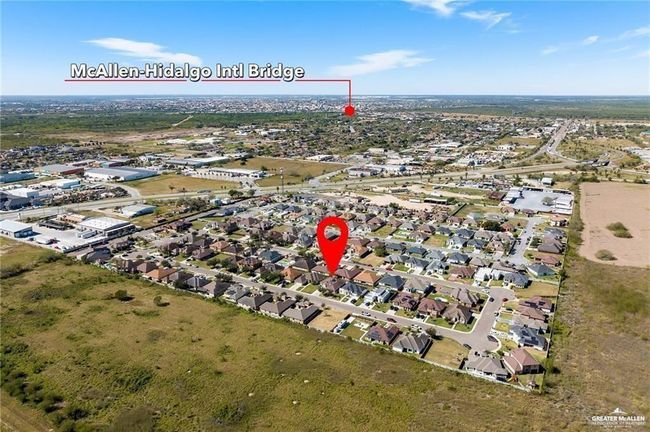 Aerial view of property and surrounding area featuring nearby suburban area | Image 16