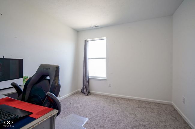 carpeted office space with baseboards | Image 25