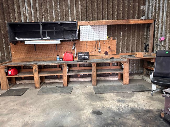 Miscellaneous room with a workshop area and concrete floors | Image 32