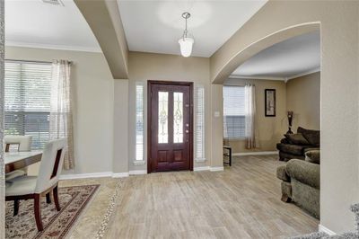 Large entryway with tall ceilings | Image 3