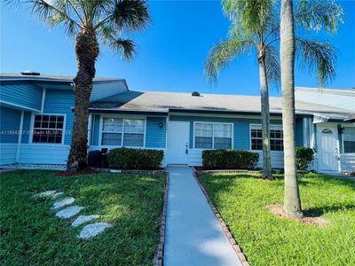 7341 Tam Oshanter Blvd, Townhouse with 2 bedrooms, 2 bathrooms and null parking in North Lauderdale FL | Image 1