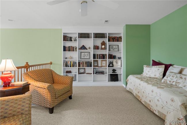 Bedroom featuring carpet floors and a ceiling fan | Image 34