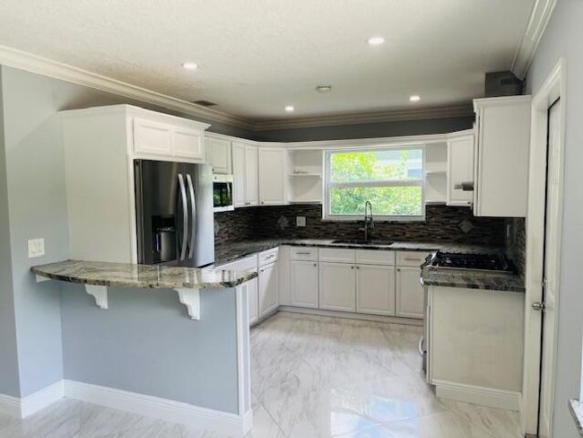 505 Sw All American Boulevard, House other with 3 bedrooms, 2 bathrooms and null parking in Palm City FL | Image 3