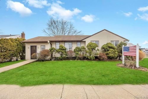 303 Woodbury Rd, Hicksville, NY, 11801-3012 | Card Image