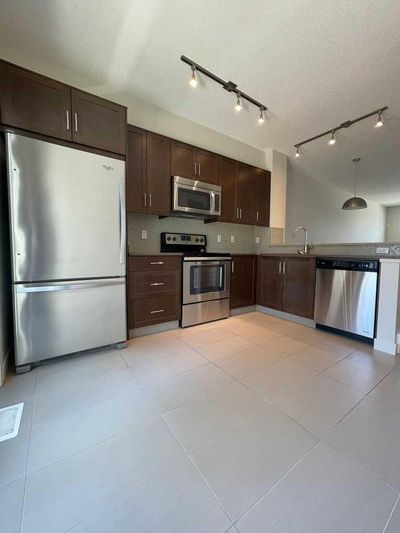 105 Sherwood Row Nw, Townhouse with 2 bedrooms, 2 bathrooms and 2 parking in Calgary AB | Image 3