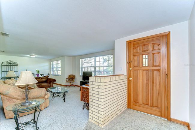 Living room and front door foyer | Image 13