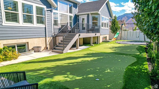 Exterior space featuring fence and a mountain view | Image 7