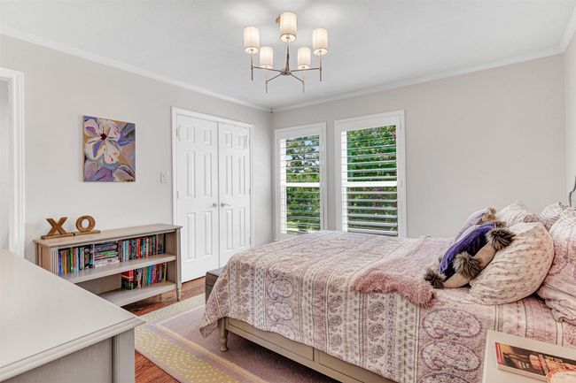 Three spacious bedrooms are upstairs off the game room, two share a jack & jill bath, all with fresh paint and updated light fixtures. | Image 15