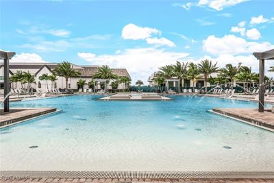 View of pool featuring pool water feature | Image 2