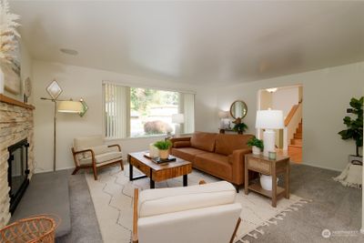 Spacious living room, ideal for relaxation and entertainment, with an open layout for versatile furniture arrangements. | Image 3