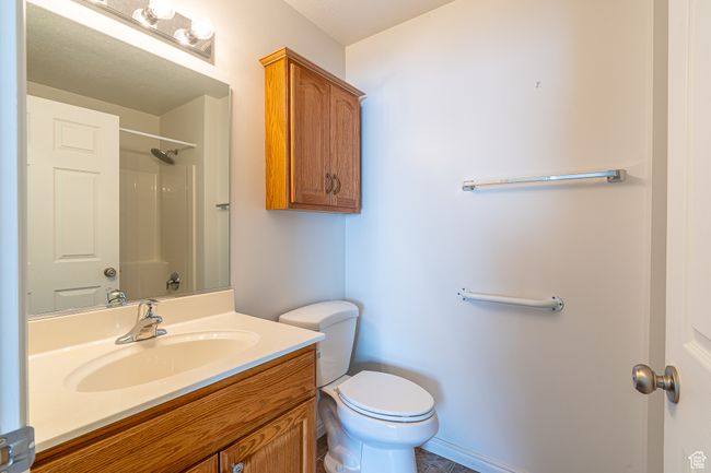 Full bathroom with vanity, toilet, and walk in shower | Image 21