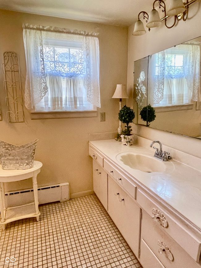Owners bathroom featuring plenty of natural light and vanity | Image 30