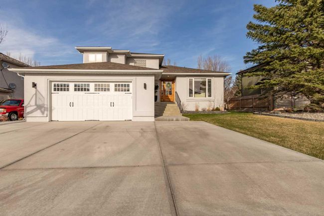 23 Canyon Close W, Home with 4 bedrooms, 3 bathrooms and 5 parking in Lethbridge AB | Image 1