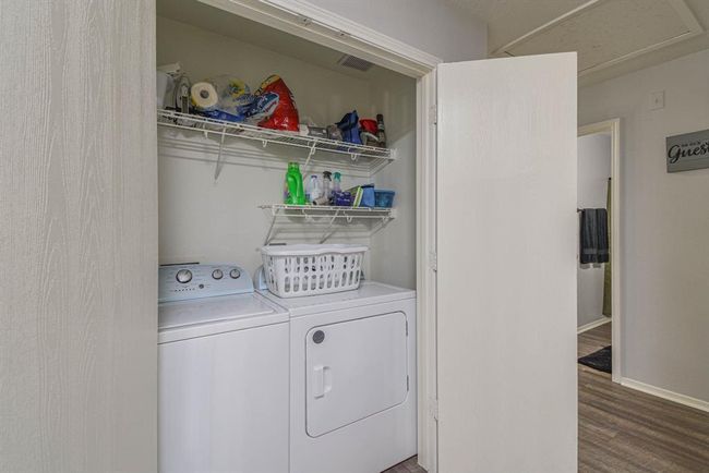 Laundry room with storage | Image 8