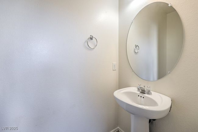 Bathroom featuring a sink | Image 38