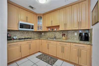 220 E 61st St, House other with 6 bedrooms, 3 bathrooms and null parking in Hialeah FL | Image 3