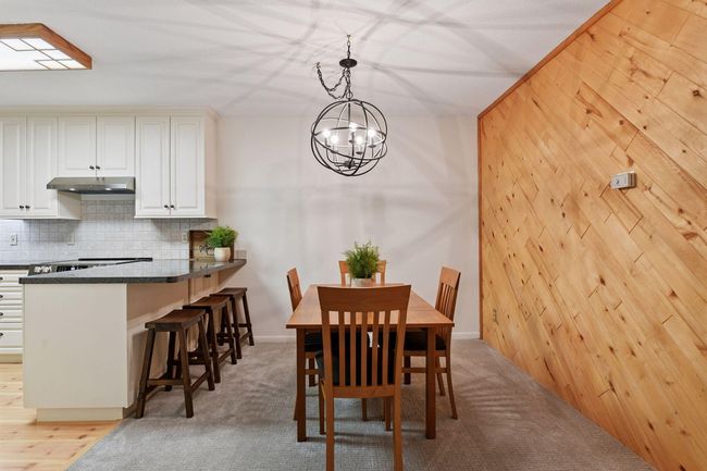 A large walk-closet is behind the wood wall. | Image 16