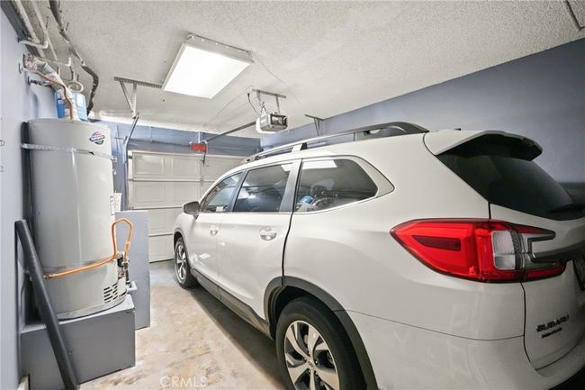 Downstairs: 1 car attached garage, Laundry hook-ups and garage motor is only 6 months old. | Image 14