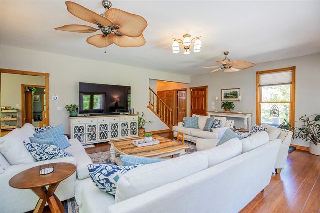 Entertainment sized living room with access to porch to extend the space to the outdoors. | Image 9