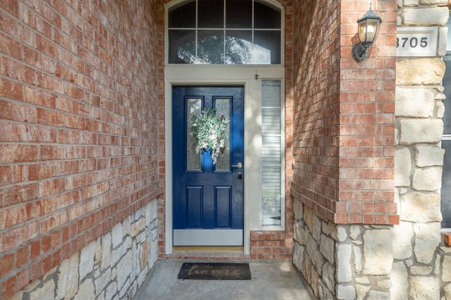 Property entrance featuring brick siding | Image 5