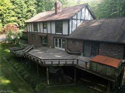 Back of property featuring a wooden deck | Image 3