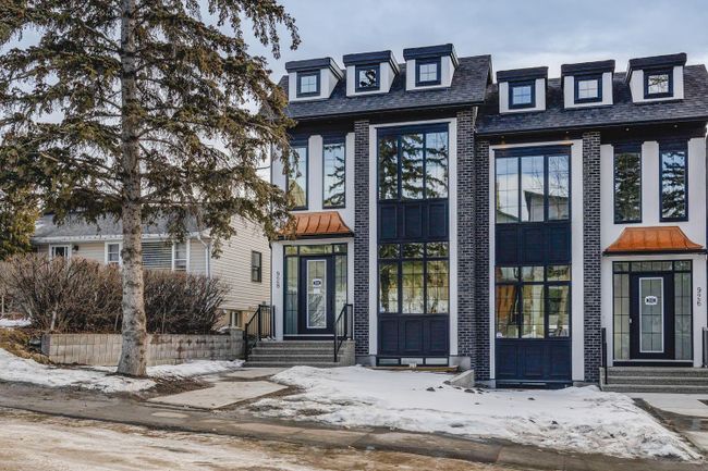 928 33 A Street Nw, Home with 4 bedrooms, 3 bathrooms and 2 parking in Calgary AB | Image 1