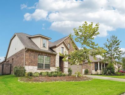 Home elevation is brick and stone | Image 1