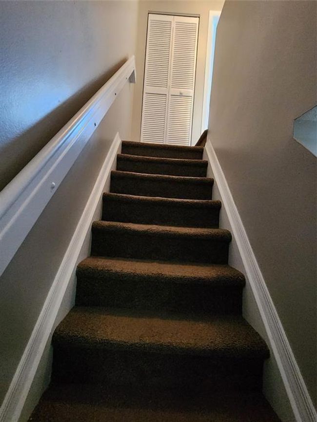 Interior stairs to the second floor | Image 13