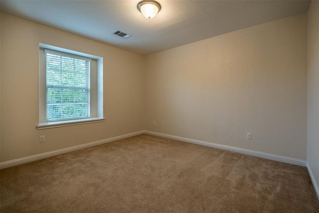 Unfurnished room with carpet and baseboards | Image 13
