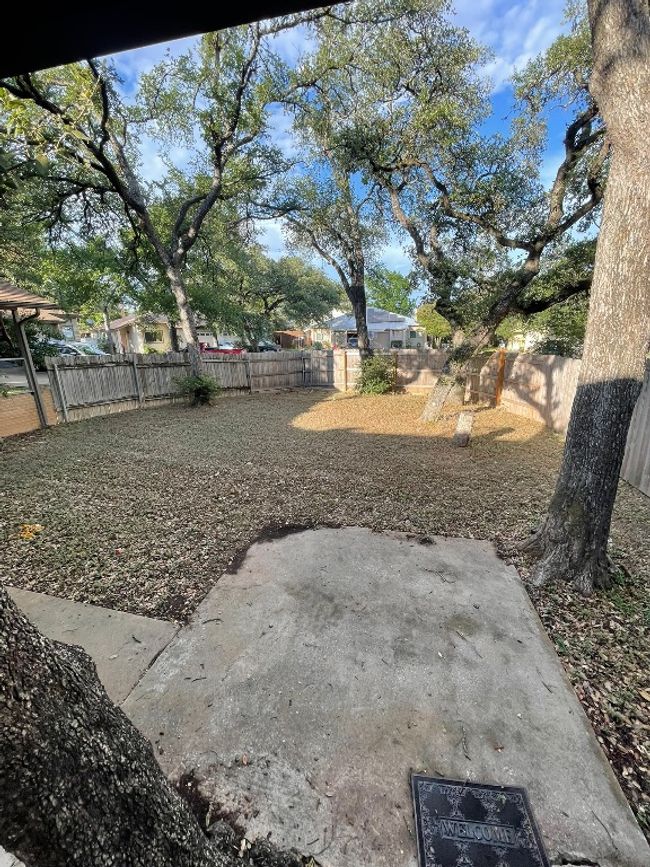 Fenced backyard featuring a patio area | Image 15