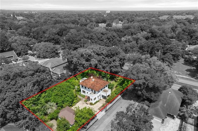 Bird's eye view featuring a wooded view | Image 35