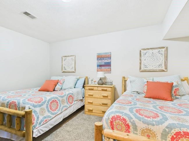Bedroom 2 featuring visible vents and carpet floors | Image 56