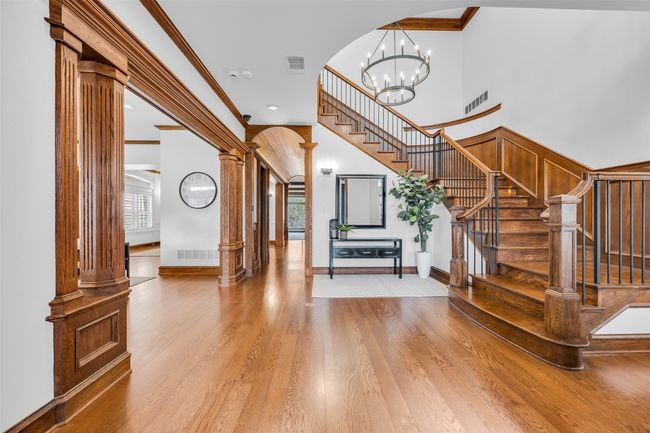 Front entrance with a view into the formal living and dining rooms | Image 8
