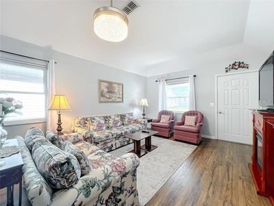 Notice the newer vinyl plank flooring throughout this home. | Image 3