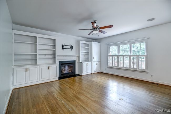 Built in's, gas fireplace & cafe shutters. | Image 10