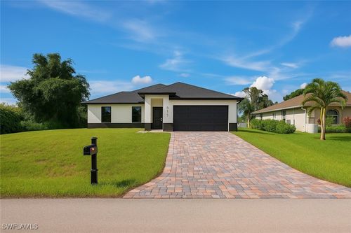 311 Ranier Ave, LEHIGH ACRES, FL, 33974-2424 | Card Image