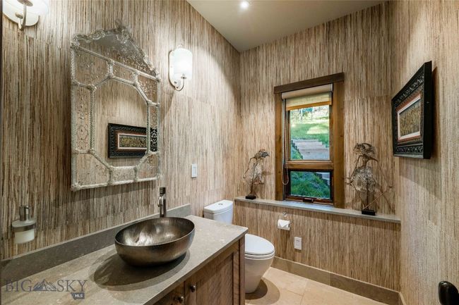 Main level powder room. | Image 36