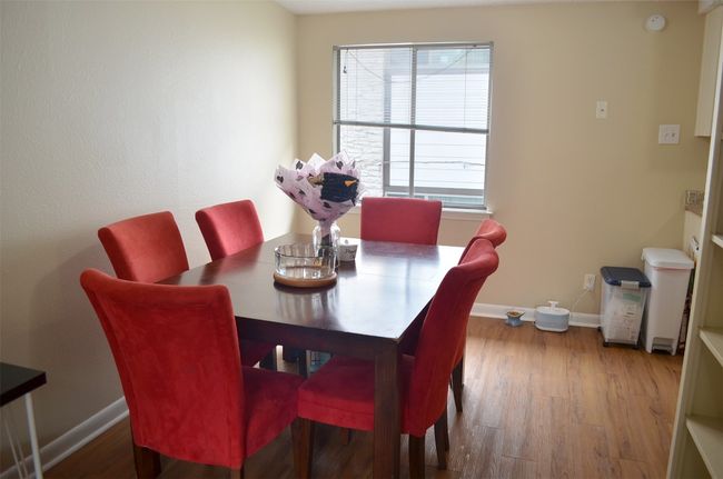 Dining space featuring wood finished floors | Image 5