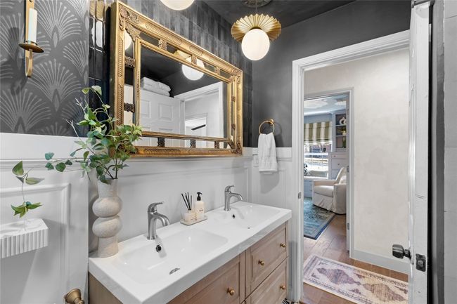 Bathroom with vanity and hardwood / wood-style floors | Image 30