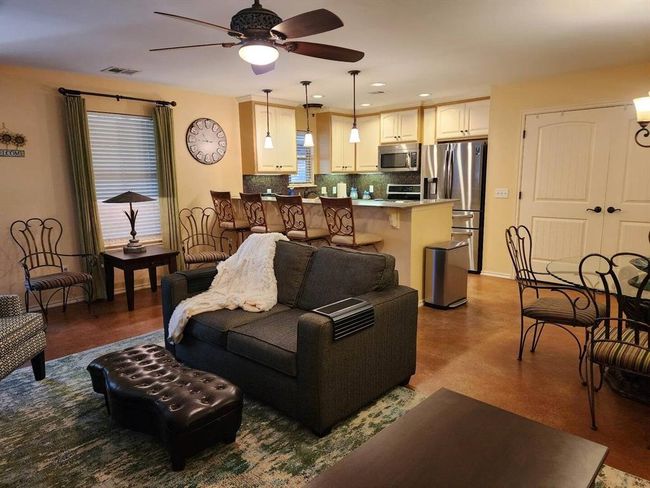 Living room featuring a ceiling fan and recessed lighting | Image 14