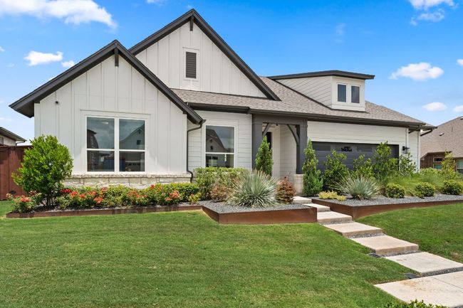 Situated on a premium lot, this home offers privacy and beauty from the moment you arrive. | Image 37