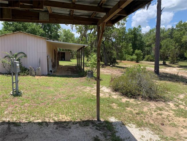 24645 Ne 177 Th Ter, House other with 2 bedrooms, 1 bathrooms and null parking in Fort Mc Coy FL | Image 64