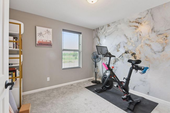Among the many upgrades, the seller opted for flat paneled doors with matte black hardware throughout the home. | Image 14